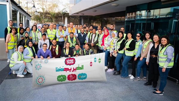 موظفو أمان وريفي وتمويلي يشاركون في شراء وتوزيع شنط رمضان